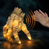 Diagram showing the skeleton hand reactivating when someone claps nearby